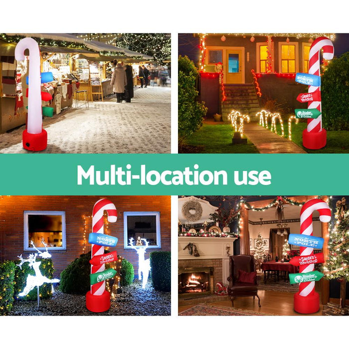 Bostin Life Jingle Jollys 2.4M Christmas Inflatable Santa Guide Candy Pole Xmas Decor Led Occasions
